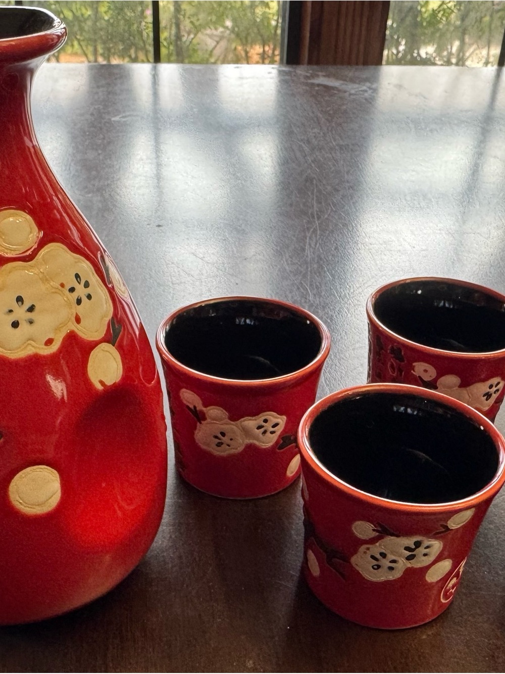 Red Ceramic Sake Set with Floral Accents